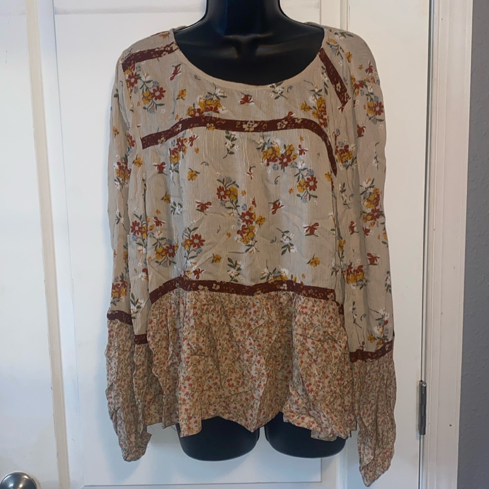 Size large boho styled long sleeved top.